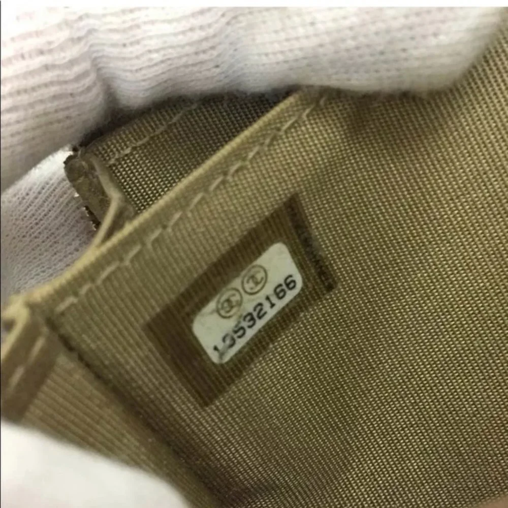 authentic CHANEL Quilted  CC Logo Lambskin Zip